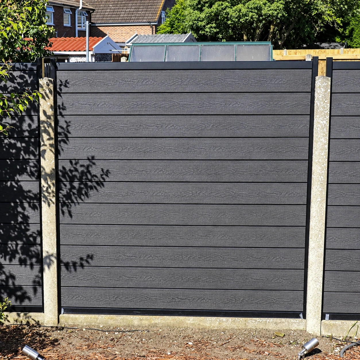 Dark horizontal composite-style boundary with pale posts and stepped levels