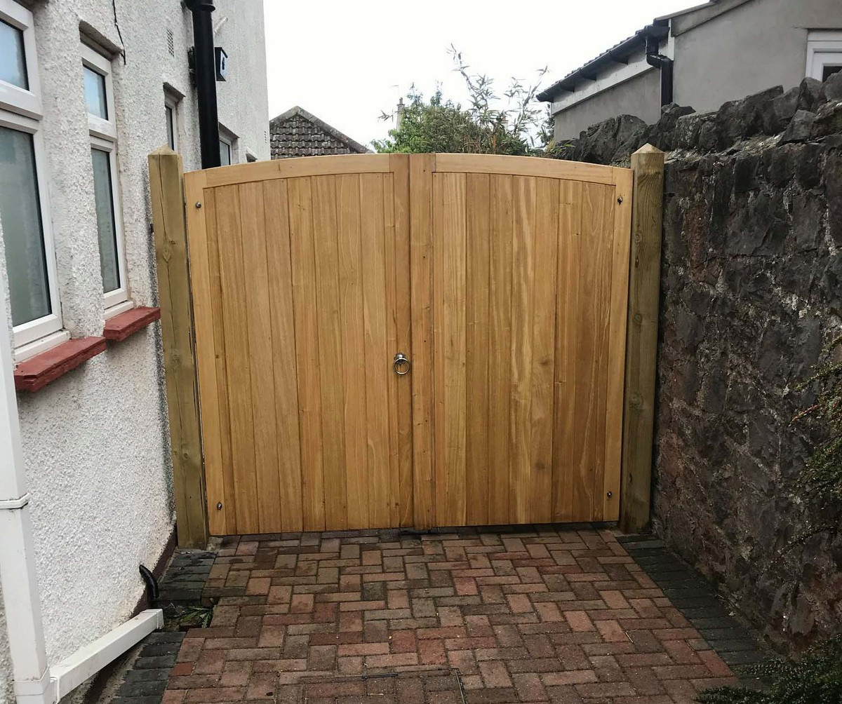 Natural timber driveway gate