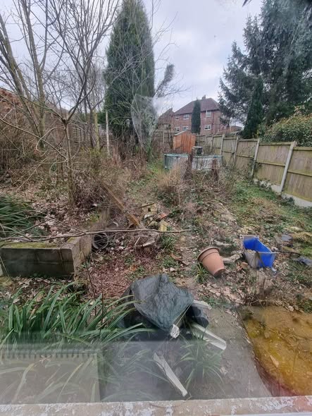 Cheddleton garden during hedge and vegetation clearance, with the old boundary still visible